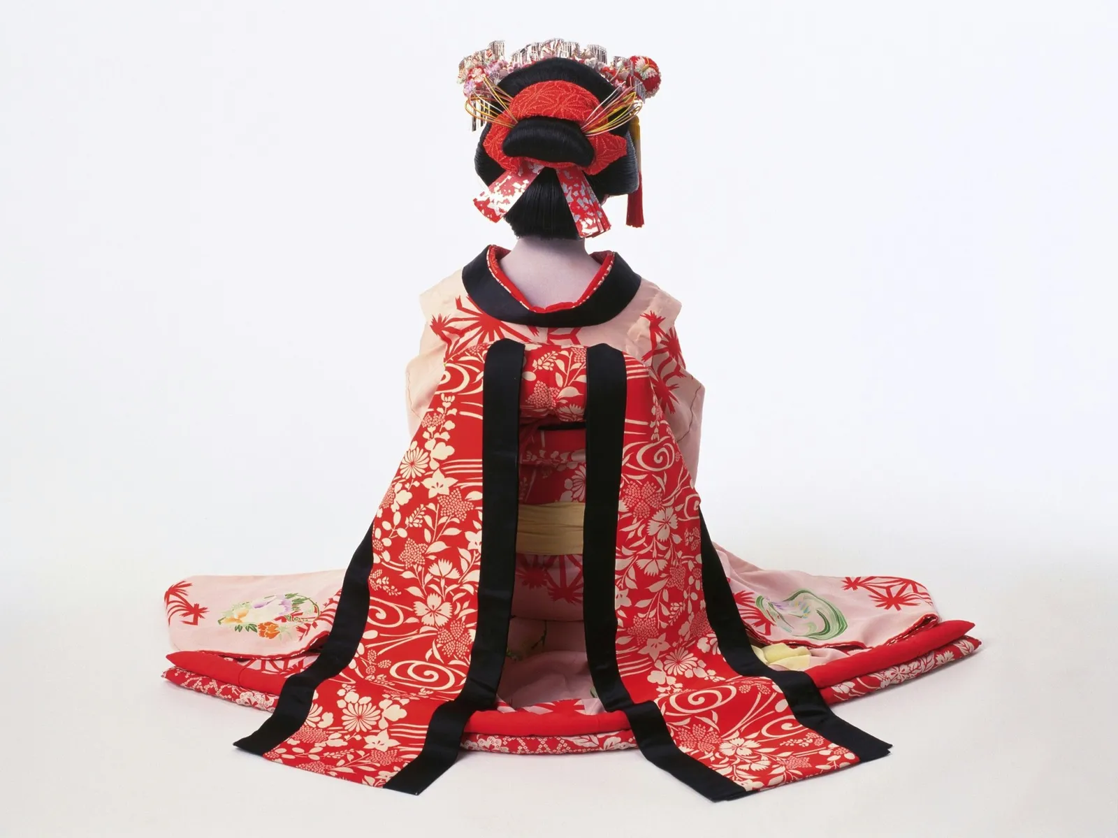 Portrait of a Kabuki actor acting as female sitting down, Rear View